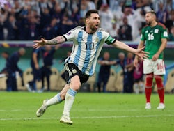 Argentina's Lionel Messi celebrates scoring their first goal on November 26, 2022