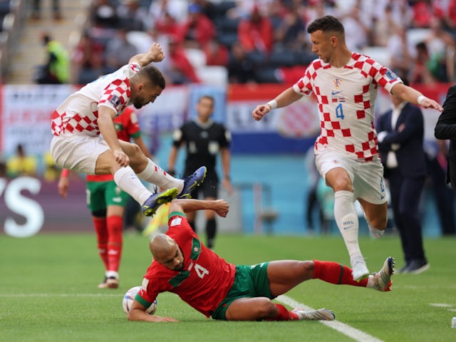 Sofyan Amrabat makes a challenge for Morocco against Croatia in their World Cup game on November 23, 2022.