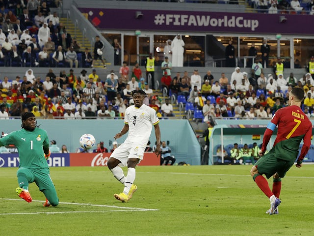 Portugal forward Cristiano Ronaldo shoots against Ghana at the World Cup on November 24, 2022