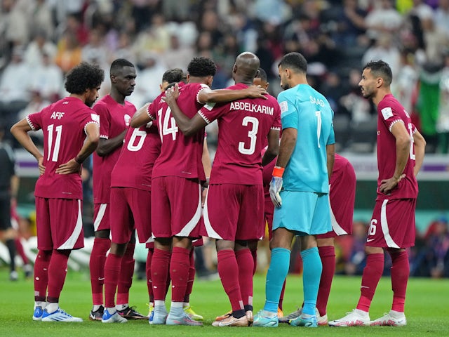 Qatar huddle during the first half during a group stage match during the 2022 FIFA World Cup at Al Bayt Stadium on November 20, 2022