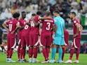 Qatar huddle during the first half during a group stage match during the 2022 FIFA World Cup at Al Bayt Stadium on November 20, 2022