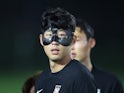 South Korea's Son Heung-min serving gimp mask on November 22, 2022