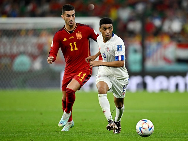 Spain's Ferran Torres in action with Costa Rica's Jewison Bennette at the World Cup on November 23, 2022