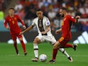 Germany's Jamal Musiala in action with Spain's Dani Carvajal at the World Cup on November 27, 2022