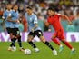 South Korea's Na Sang-ho in action with Uruguay's Darwin Nunez at the World Cup on November 24, 2022