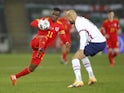 Wales' Rabbi Matondo in action with United States' John Brooks in November 2020