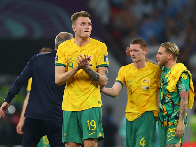Australia players react to being knocked out of the World Cup on December 3, 2022