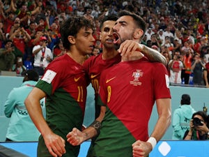 Fernandes brace guides Portugal into knockout rounds