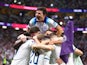 England players celebrate Harry Kane's goal against Senegal on December 4, 2022