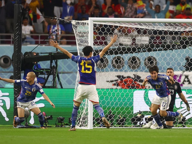 Japan's Ao Tanaka celebrates scoring against Spain at the World Cup on December 1, 2022