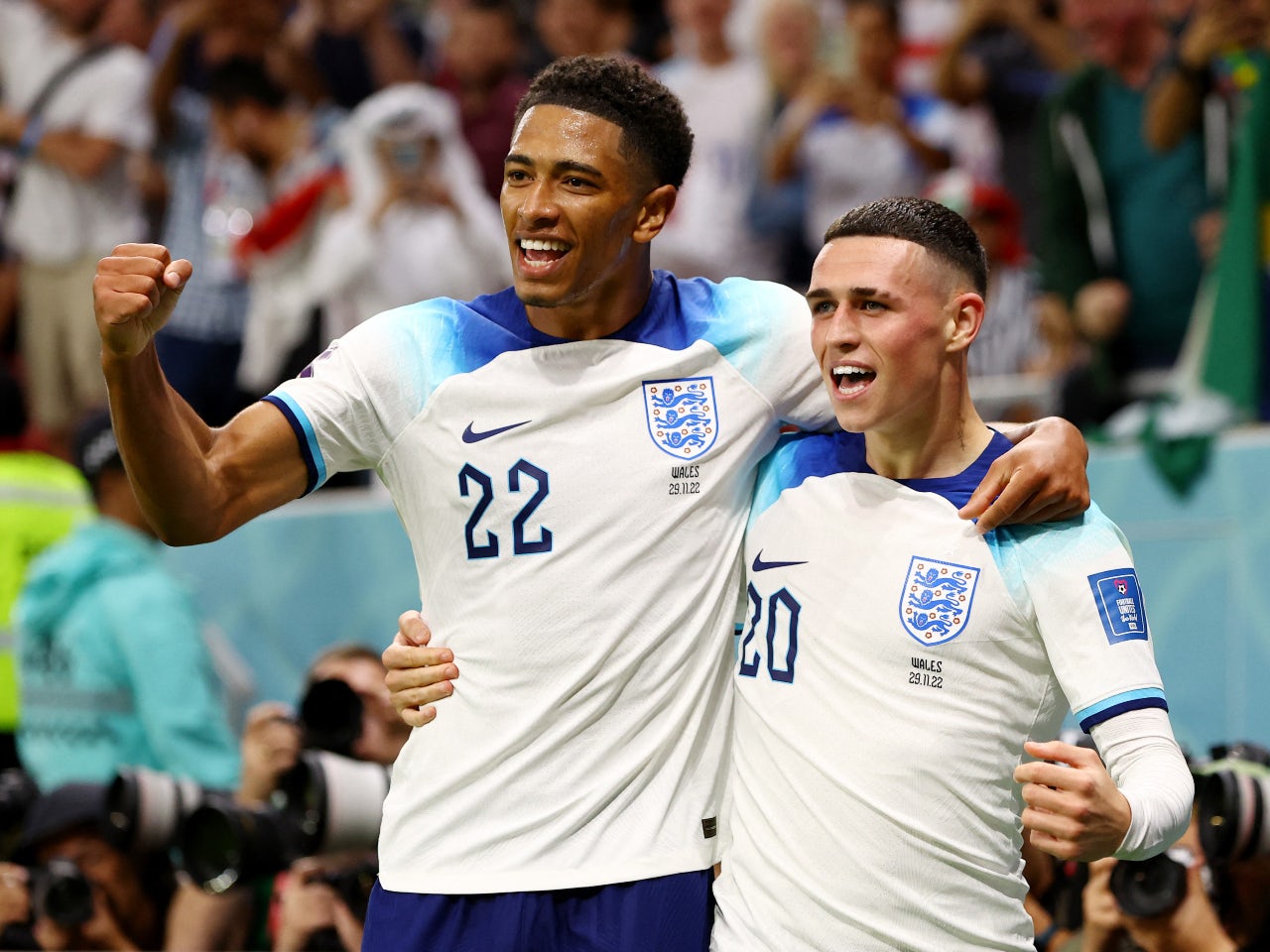  Jude Bellingham, Phil Foden and Cole Palmer celebrating a goal for England during the 2022 World Cup.