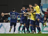 Argentina's Alexis Mac Allister celebrates scoring against Poland at the World Cup on November 30, 2022