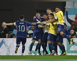 Argentina top Group C with win over Poland, who also qualify for last 16