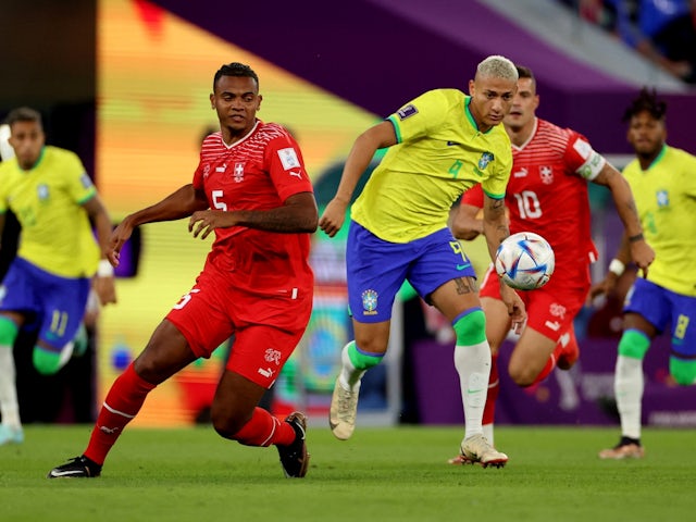 Brazil's Richarlison in action with Switzerland's Manuel Akanji on November 28, 2022