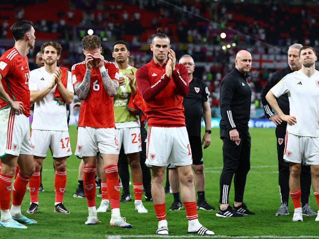 Wales players clap the fans after being eliminated from the World Cup on November 29, 2022