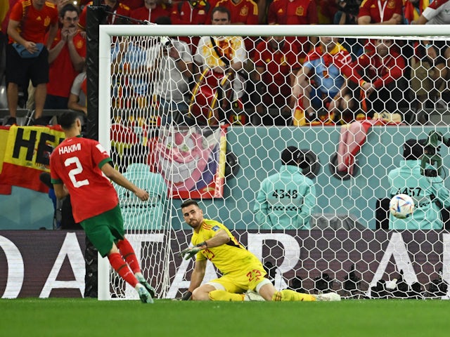 Morocco's Achraf Hakimi scores the winning penalty against Spain on December 6, 2022