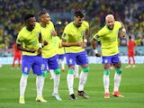 Brazil celebrate one of their first-half goals against South Korea at the World Cup on December 5, 2022.