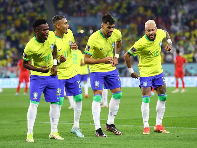Brazil celebrate one of their first-half goals against South Korea at the World Cup on December 5, 2022.