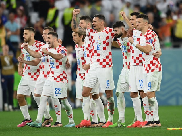 Croatia players react during their penalty-shootout win over Brazil at the World Cup on December 9, 2022
