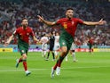 Portugal's Goncalo Ramos celebrates with Bernardo Silva after scoring their first goal on December 6, 2022