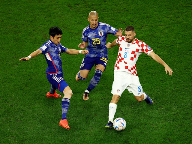 Croatia's Mateo Kovacic in action with Japan's Daizen Maeda and Wataru Endo at the World Cup on December 5, 2022