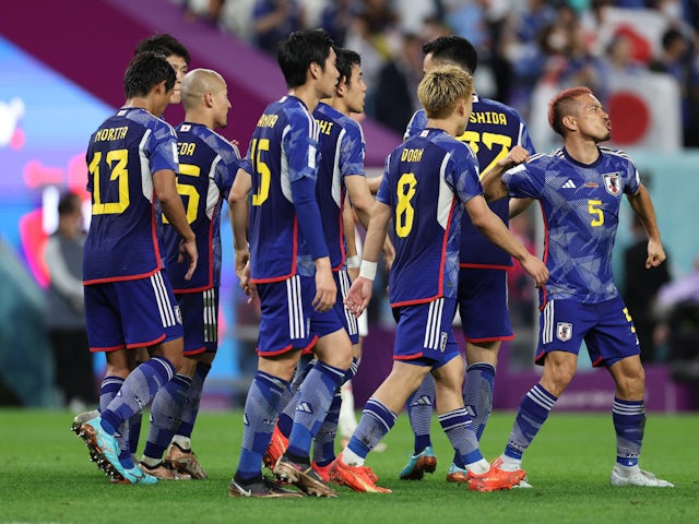 Japan players celebrate Daizen Maeda's goal against Croatia at the World Cup on December 5, 2022