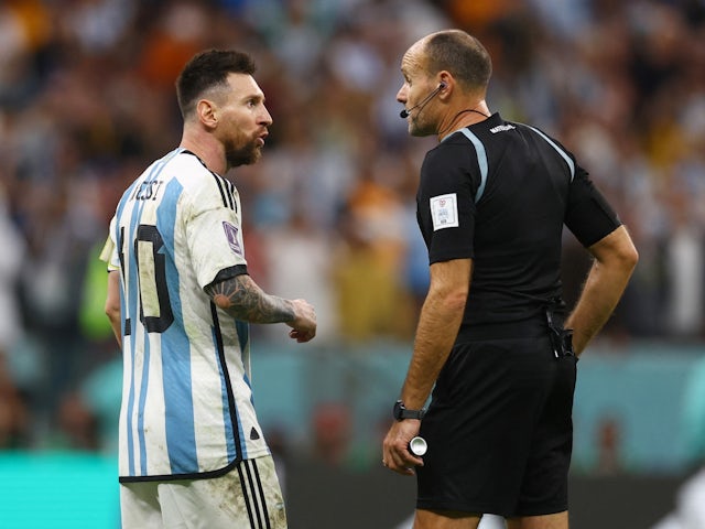 Argentina's Lionel Messi remonstrates with referee Antonio Mateu Lahoz on December 9, 2022