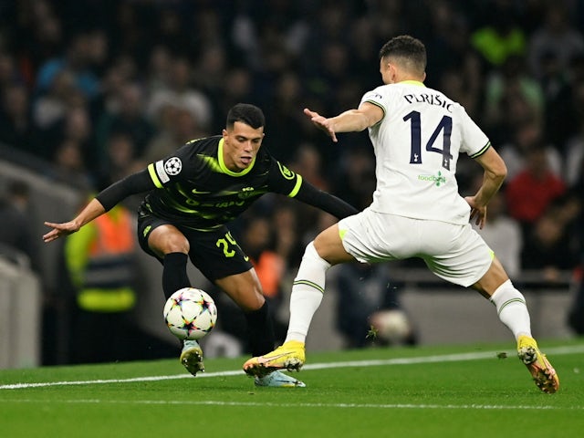 Pedro Porro of Sporting Lisbon in action with Ivan Perisic of Tottenham Hotspur on October 26, 2022