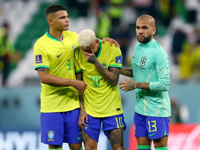 Brazil's Thiago Silva, Neymar and Dani Alves look dejected after being eliminated from the World Cup on December 9, 2022