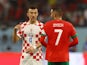 Croatia's Ivan Perisic pictured with Morocco's Hakim Ziyech at the World Cup on December 17, 2022