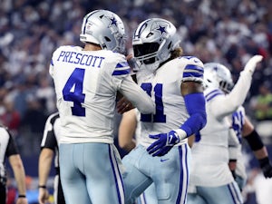 Dallas Cowboys running back Ezekiel Elliott (21) celebrates with Dallas  Cowboys quarterback Dak Prescott (4) after