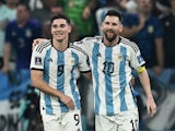 Argentina's Julian Alvarez celebrates scoring their third goal with Lionel Messi on December 13, 2022