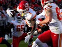 Kansas City Chiefs running back Jerick McKinnon (1) dives for a touchdown in the second quarter against the Denver Broncos at Empower Field at Mile High on December 11, 2022