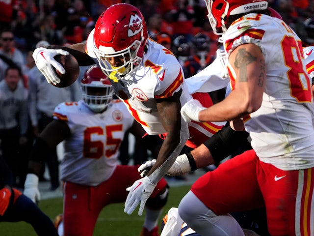 Kansas City Chiefs running back Jerick McKinnon (1) dives for a touchdown in the second quarter against the Denver Broncos at Empower Field at Mile High on December 11, 2022
