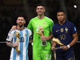 Lionel Messi, Emiliano Martinez and Kylian Mbappe pictured with their individual awards at the World Cup on December 18, 2022
