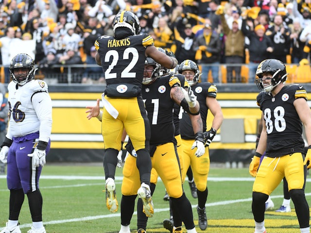 Pittsburgh Steelers running back Najee Harris (22) and offensive lineman Mason Cole (61) after scoring a touchdown against the Baltimore Ravens during the first quarter at Acrisure Stadium on December 13, 2022