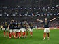 Theo Hernandez celebrates scoring for France against Morocco on December 14, 2022