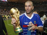 Zinedine Zidane pictured with the World Cup trophy in 1998