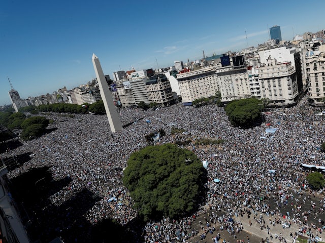 General view of the Obelisco of Buenos Aires as Argentina fans are seen ahead of the victory parade on December 20, 2022