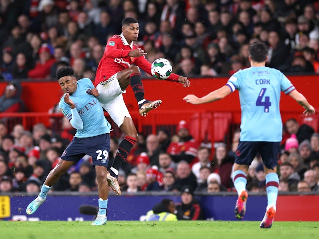 Manchester United's Marcus Rashford in action with Burnley's Ian Maatsen in the EFL Cup on December 21, 2022