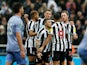 Newcastle United's Kieran Trippier and teammates celebrate after AFC Bournemouth's Adam Smith scores an own goal on December 20, 2022