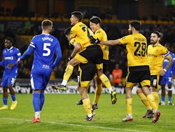 Wolverhampton Wanderers celebrate scoring against Gillingham in the EFL Cup fourth round on December 20, 2022.