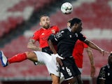 Benfica's Nicolas Otamendi in action with Vitoria Guimaraes' Abdul Mumin 