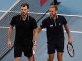 Britain's Dan Evans and Jamie Murray celebrate after winning their doubles group stage match against Germany's Alexander Zverev and Kevin Krawietz on January 2, 2022