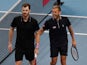 Britain's Dan Evans and Jamie Murray celebrate after winning their doubles group stage match against Germany's Alexander Zverev and Kevin Krawietz on January 2, 2022