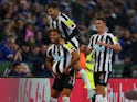 Newcastle United's Joelinton celebrates scoring their third goal with teammates on December 26, 2022