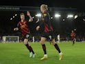 Manchester City's Erling Braut Haaland celebrates scoring their second goal with Kevin De Bruyne on December 24, 2022