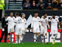 Manchester United's Marcus Rashford celebrates scoring their first goal with teammates on December 31, 2022