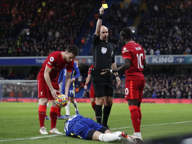 Chelsea defender Cesar Azpilicueta receives treatment after an elbow from Liverpool winger Sadio Mane on January 2, 2022.