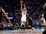 Steph Curry shoots a three-pointer for the Golden State Warriors against the Utah Jazz on January 1, 2022